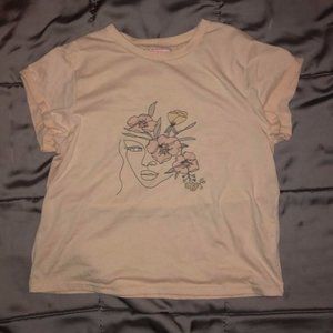 tan flower woman tee